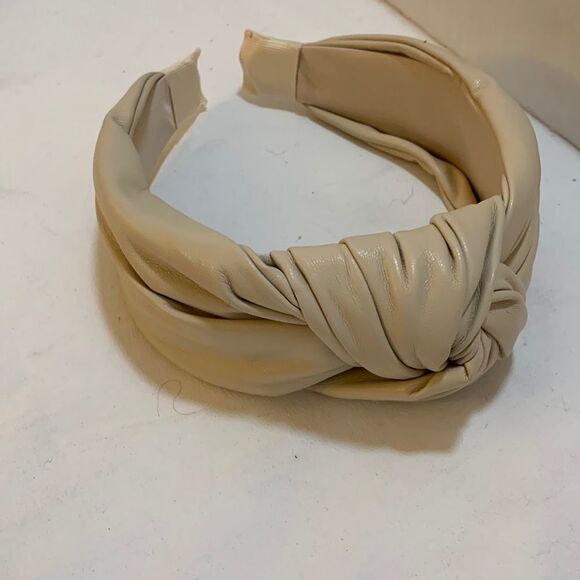 Faux leather knotted design headband. Very soft to touch - Picture 1 of 5